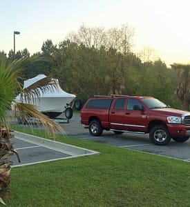 truck and boat campsite
